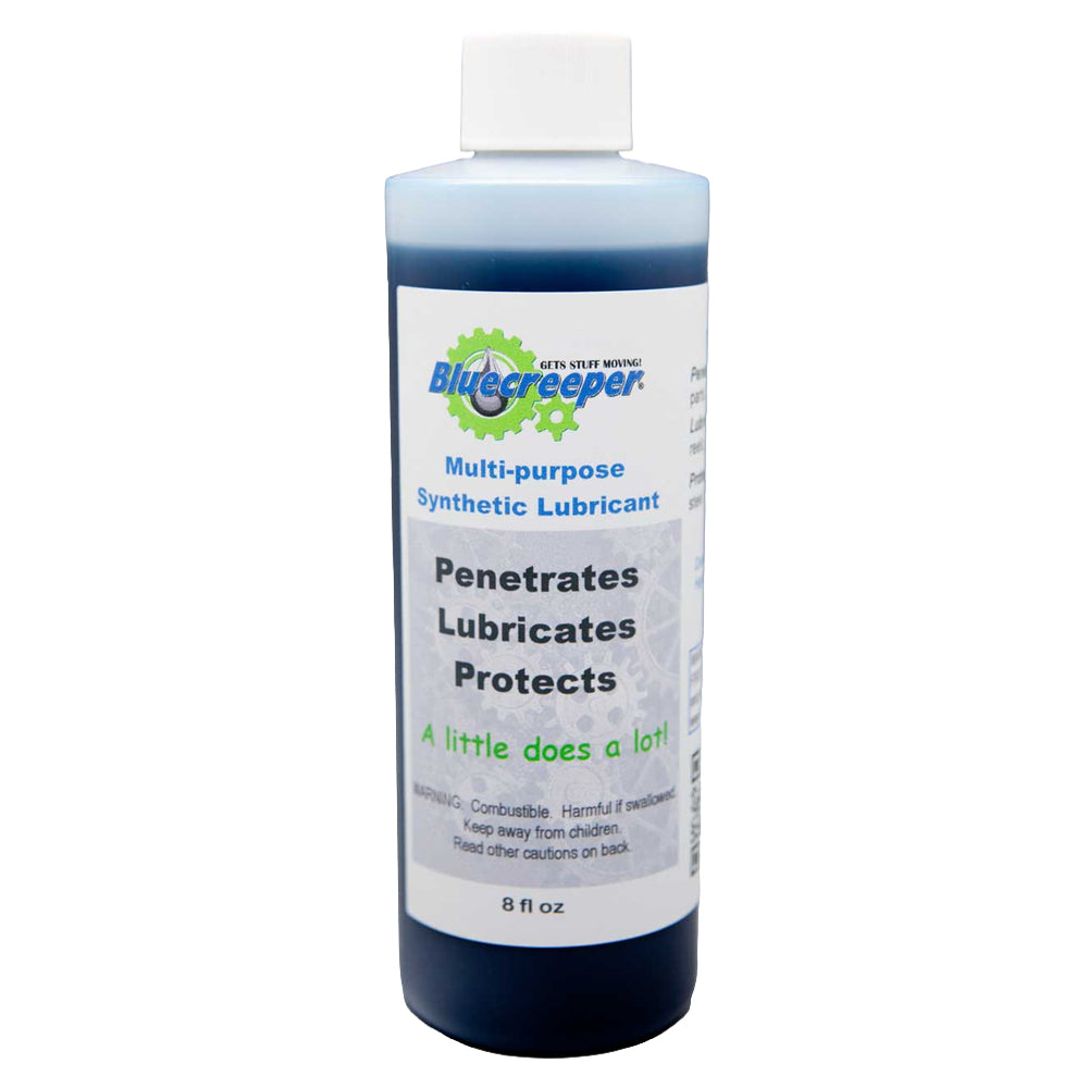 An 8 fl oz bottle of Bluecreeper Multi-purpose Synthetic Lubricant, featuring a white cap and a white label with blue and green branding, set against a plain white background.